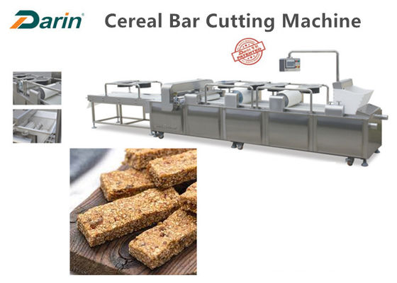 Barra a estrenar del cereal del caramelo del cacahuete que hace la máquina con el motor del PLC y de WEG de Siemens